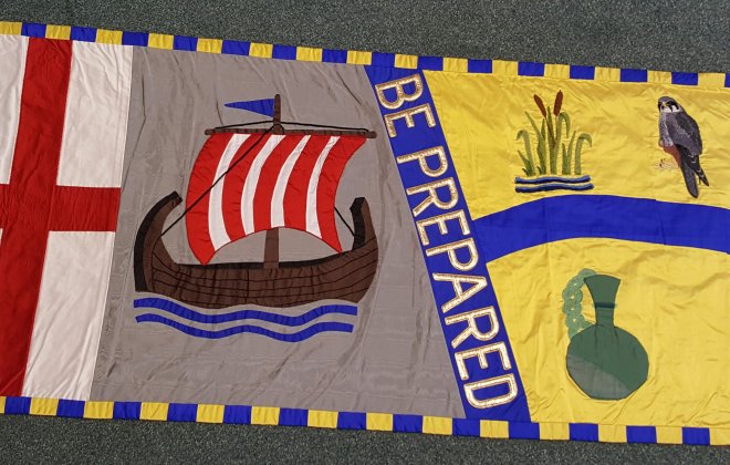 The region standard - a large piece of material embroidered with region symbols